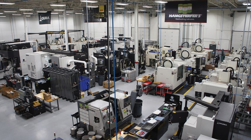 Machine shop floor lined with CNC equipment